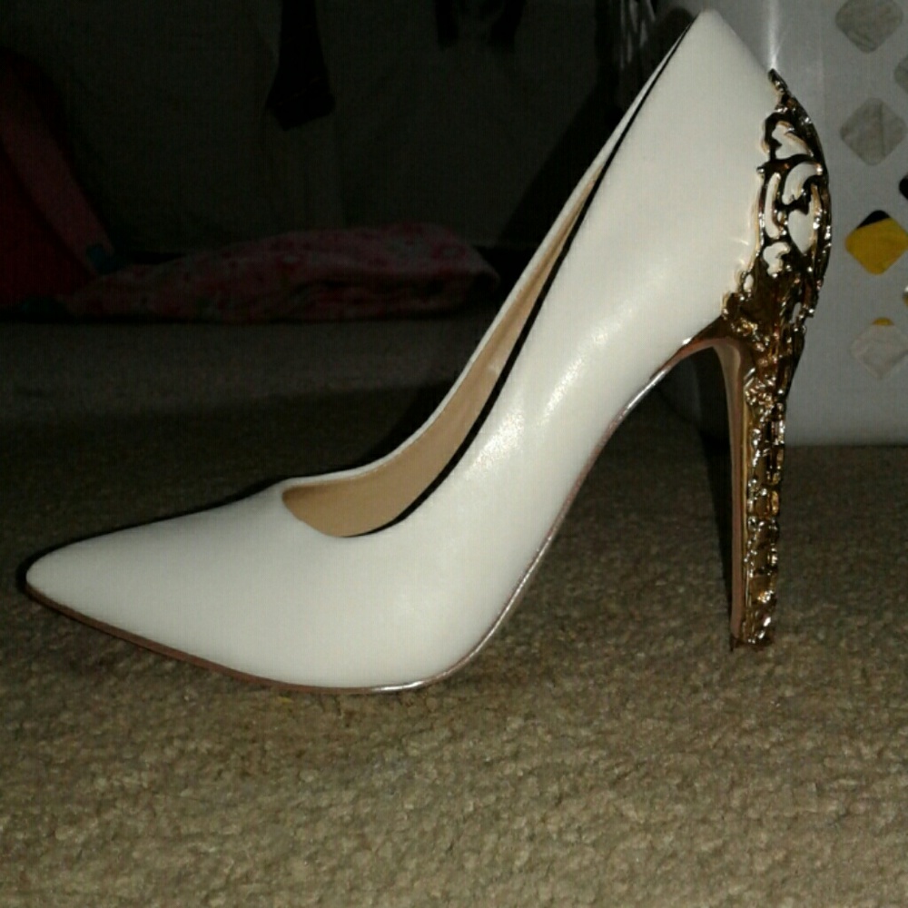 White and gold stilettos